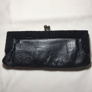 Carlo Fellini leather clutch